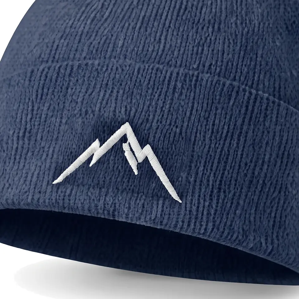 Col Rib beanie in Denim: close-up of the cuff embroidery