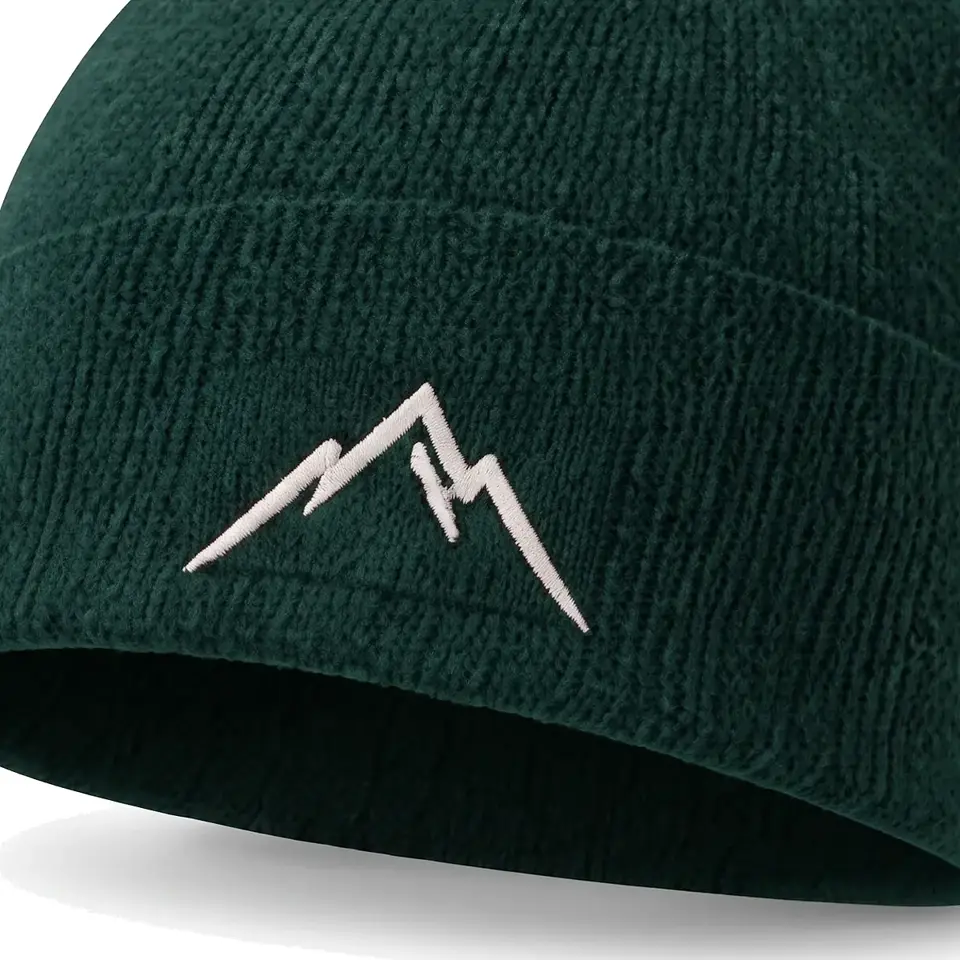 Atelier beanie in Forest: close-up of the cuff embroidery