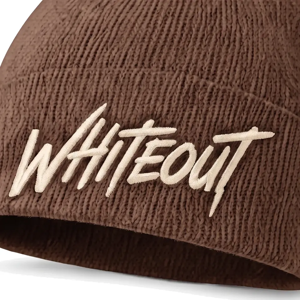 Chalet beanie in Brown: close-up of the cuff embroidery