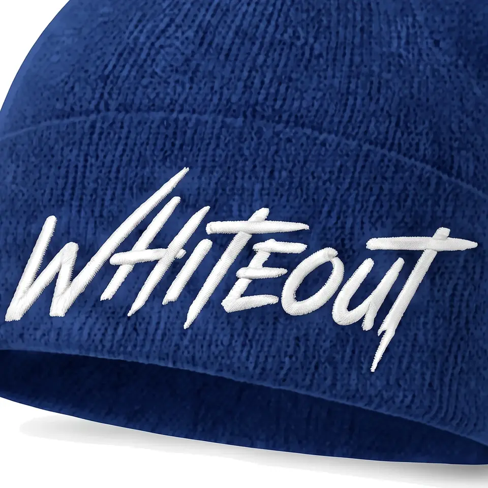 Chalet beanie in Royal Blue: close-up of the cuff embroidery