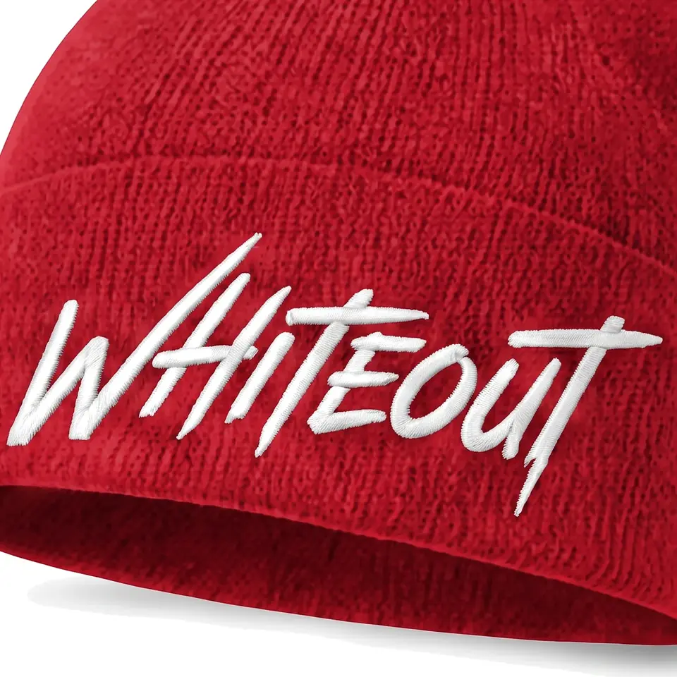 Chalet beanie in Crimson: close-up of the cuff embroidery
