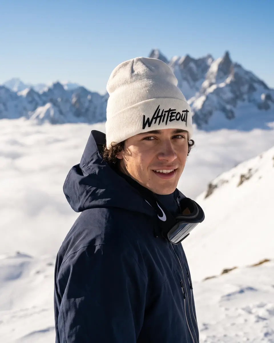 Snowboarder wearing the Chalet beanie in White