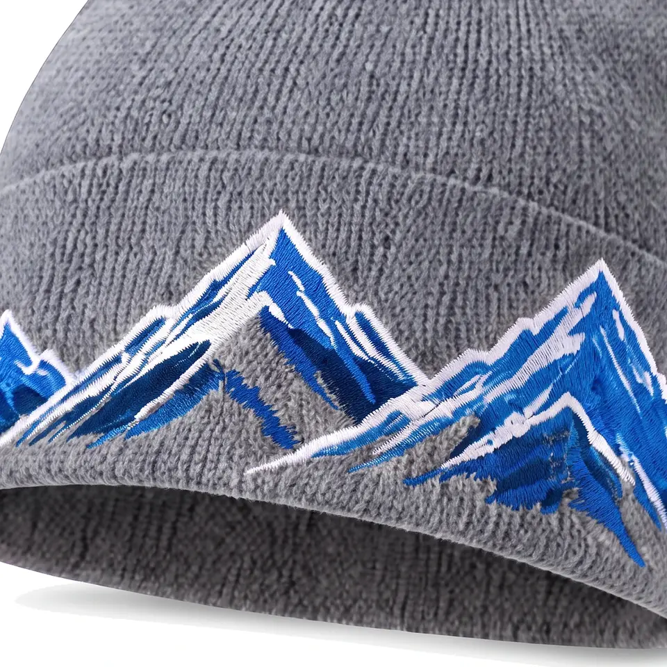 Windline beanie in Steel Grey: close-up of the cuff embroidery