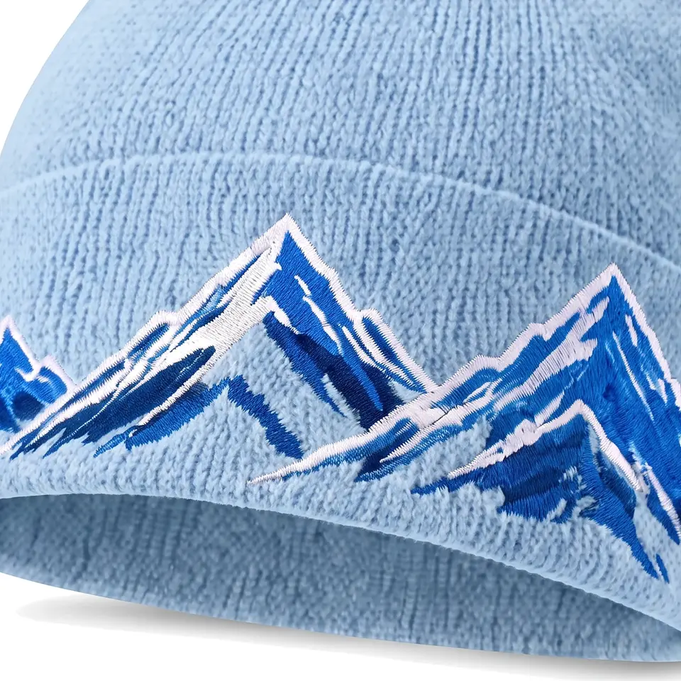 Windline beanie in Light Blue: close-up of the cuff embroidery