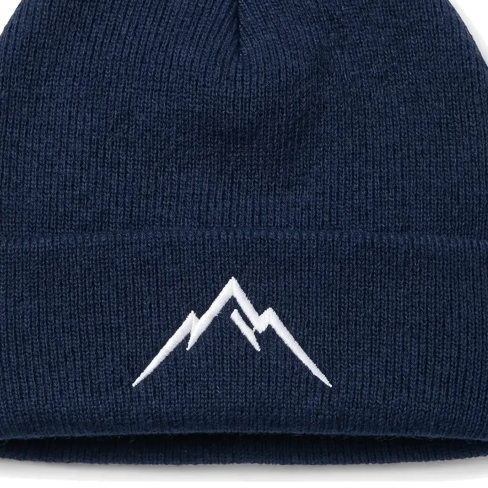 Lauber beanie in Navy: close-up of the cuff embroidery
