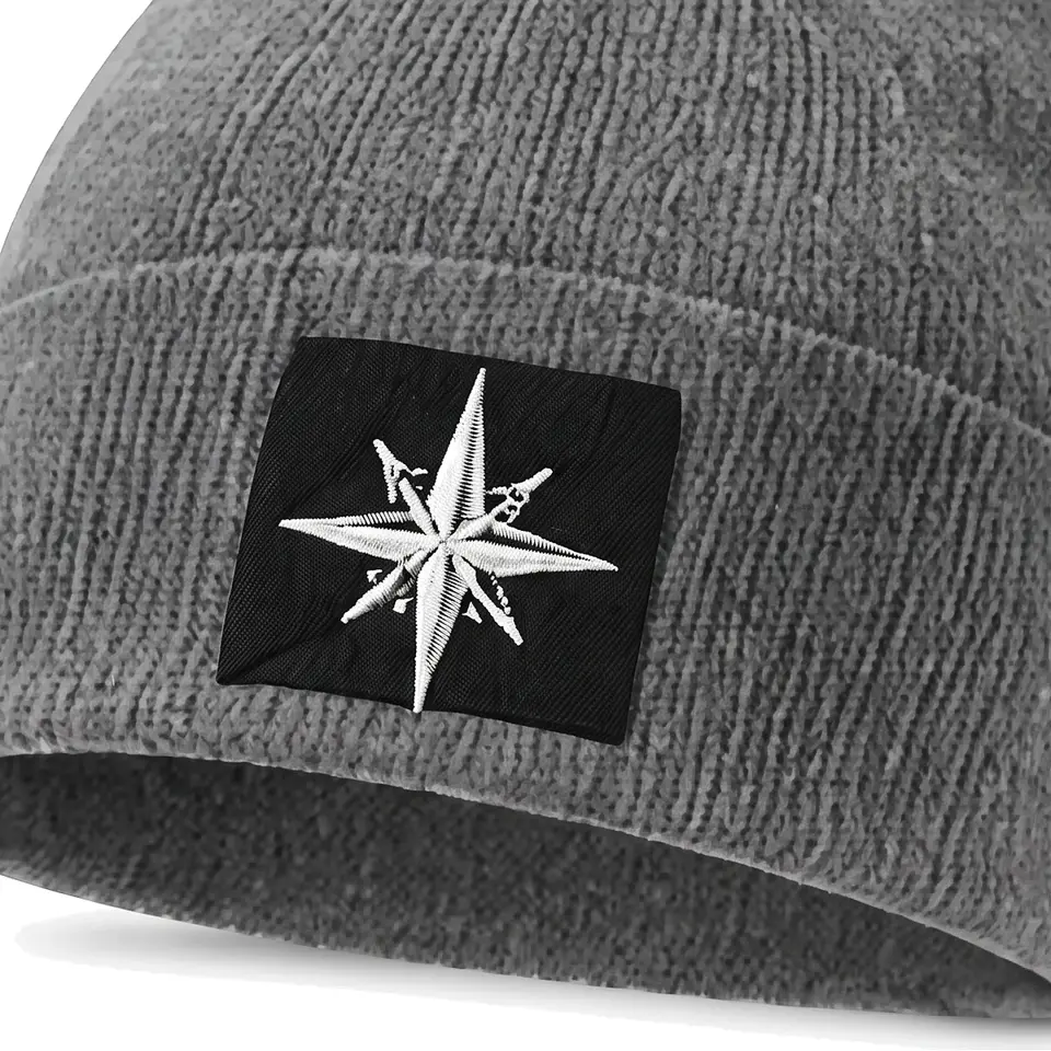 Summit beanie in Grey: close-up of the cuff patch