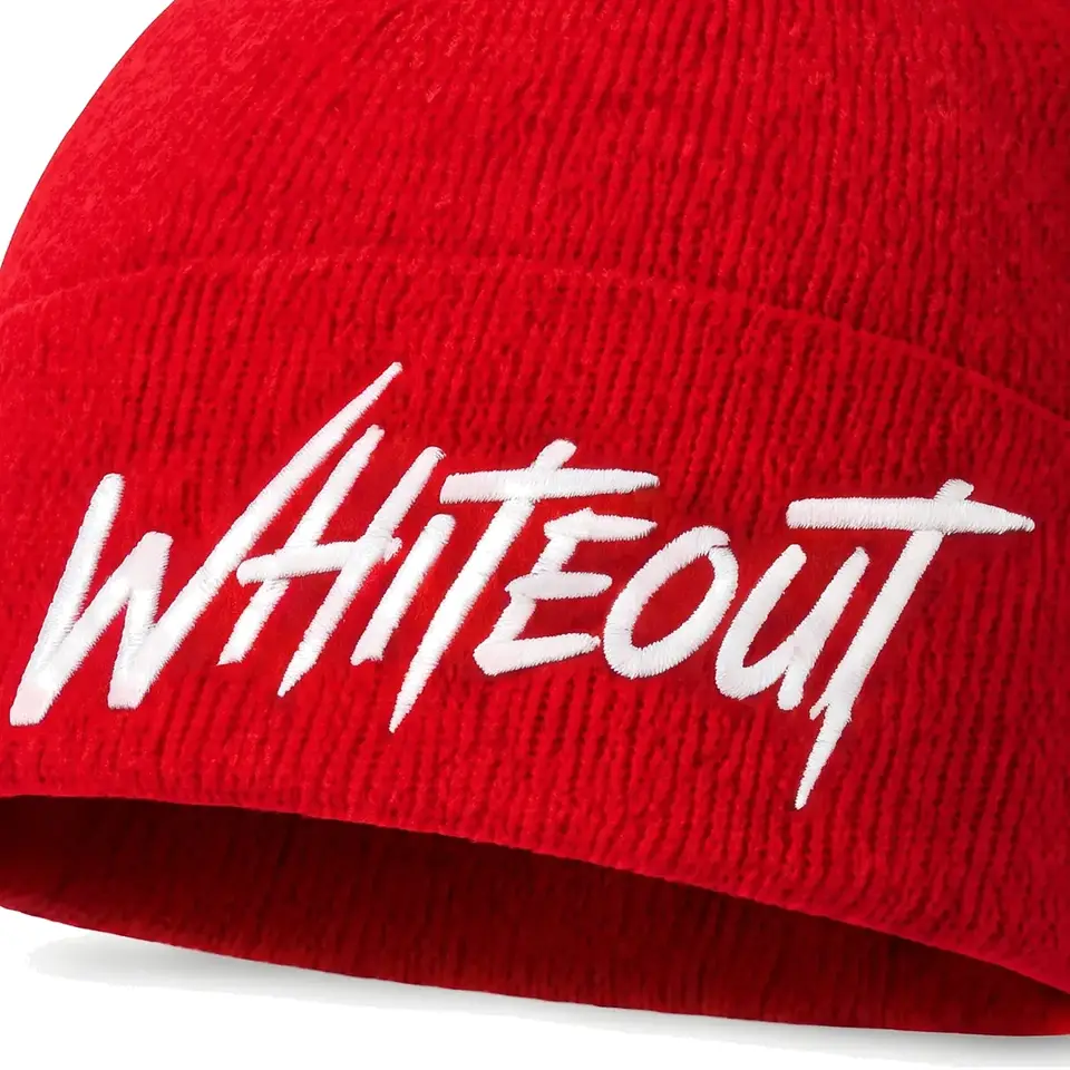 Chalet beanie in Red: close-up of the cuff embroidery