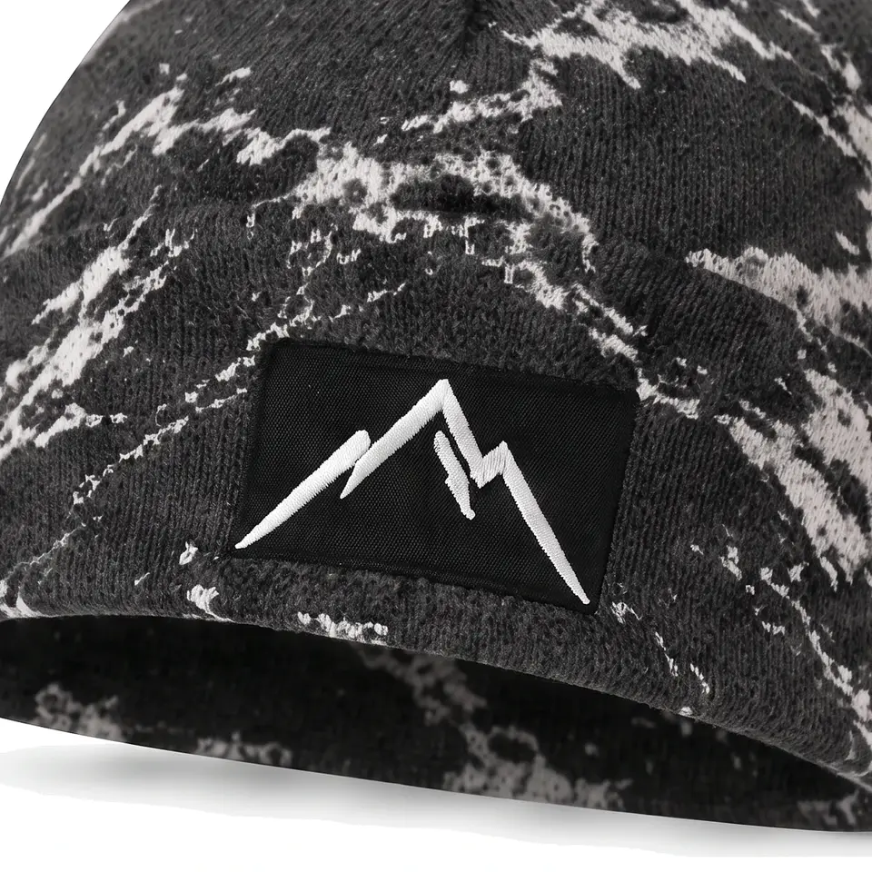 Refuge beanie in Grey Bold Marble: close-up of the cuff patch