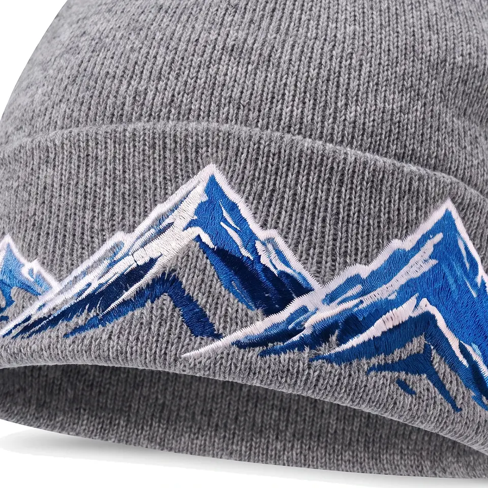 Windline beanie in Grey: close-up of the cuff embroidery
