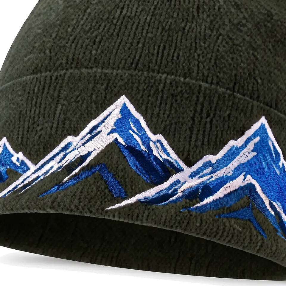 Windline beanie in Olive: close-up of the cuff embroidery