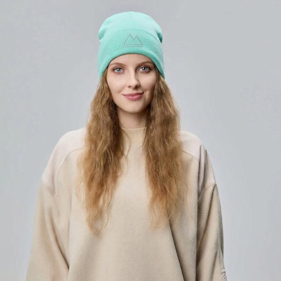 Model in the Refuge cuffed beanie
