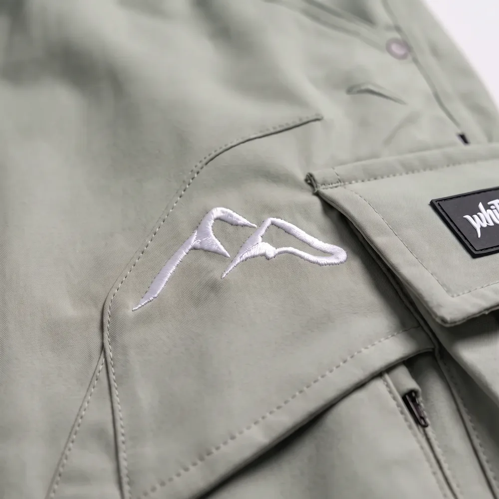 Alpine Sage Sage: logo and embroidery close-up, concept render