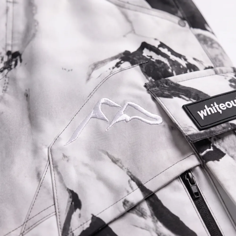 Alpine Storm White / Mountain Print: logo and embroidery close-up, concept render