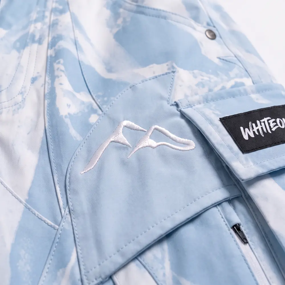 Baby Blue Frostbite Ice Blue / White Shards: logo and embroidery close-up, concept render