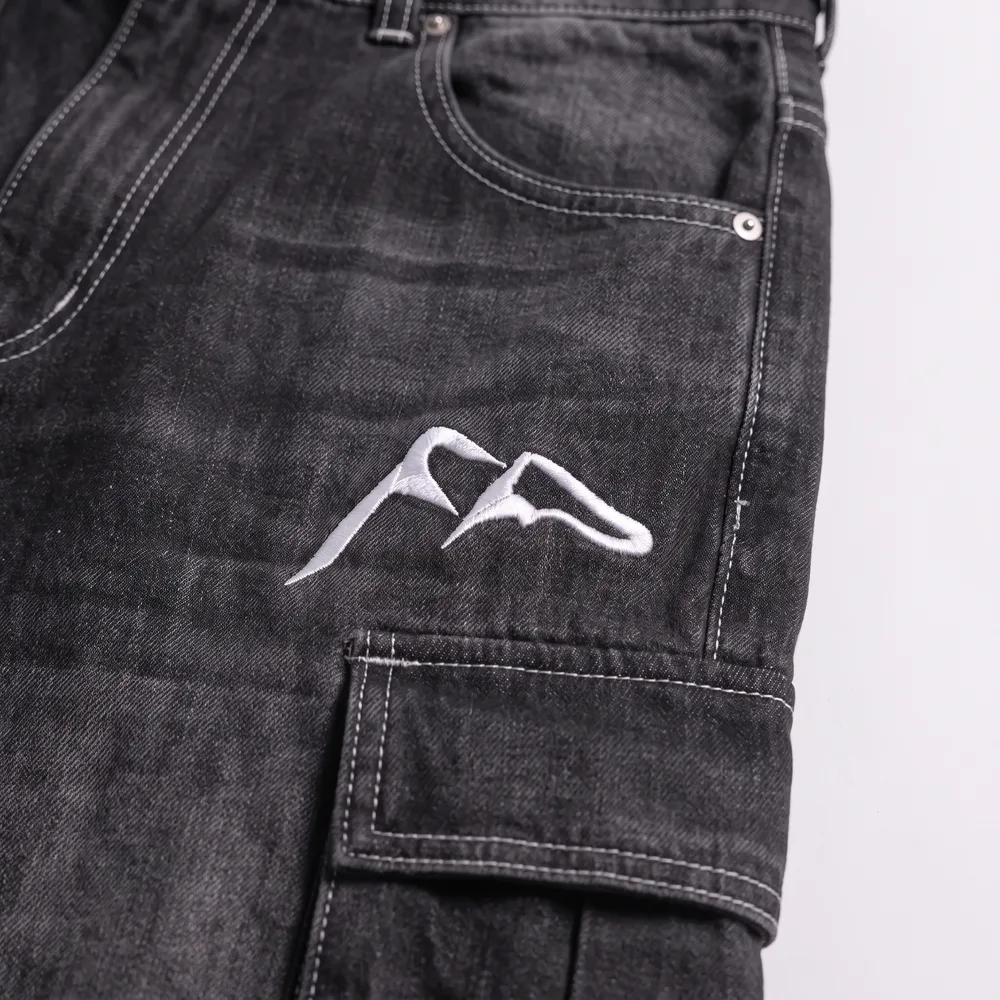 Denim Shadow Black Denim: logo and embroidery close-up, concept render