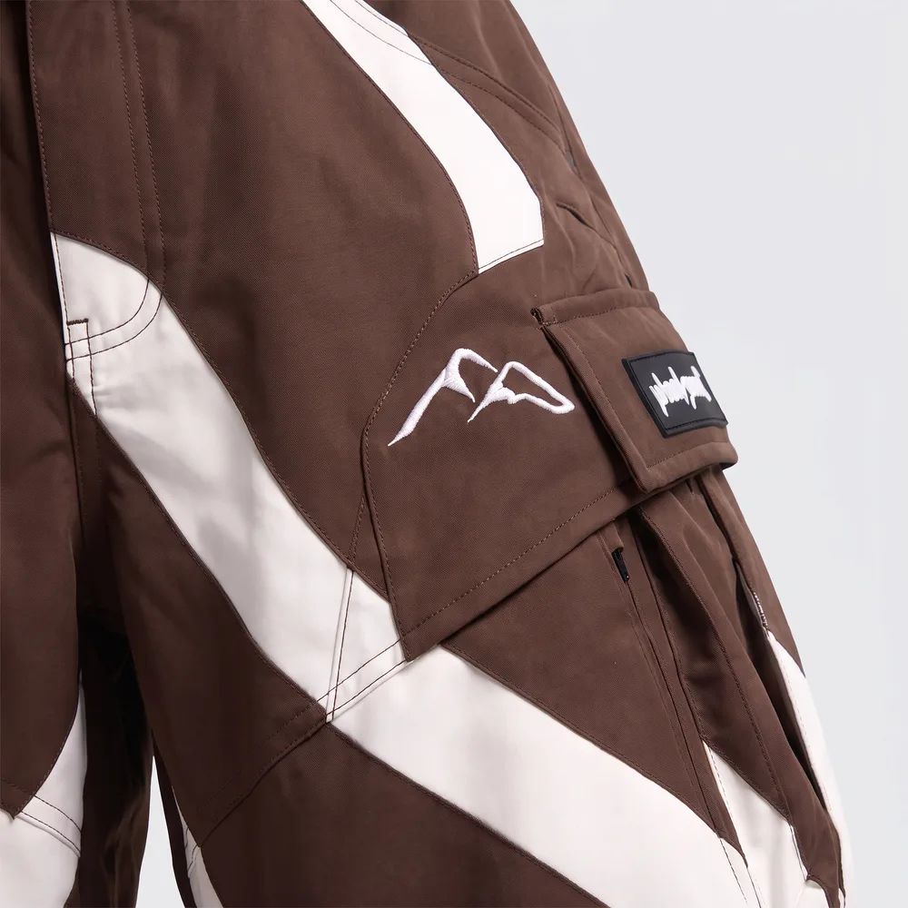 Tundra Clay Brown / White: logo and embroidery close-up, concept render