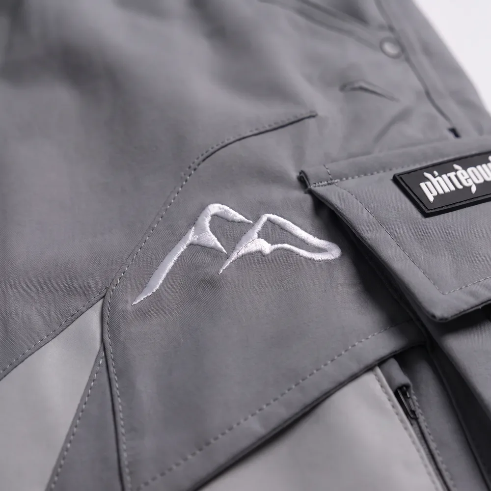Tundra Slate Slate Grey: logo and embroidery close-up, concept render