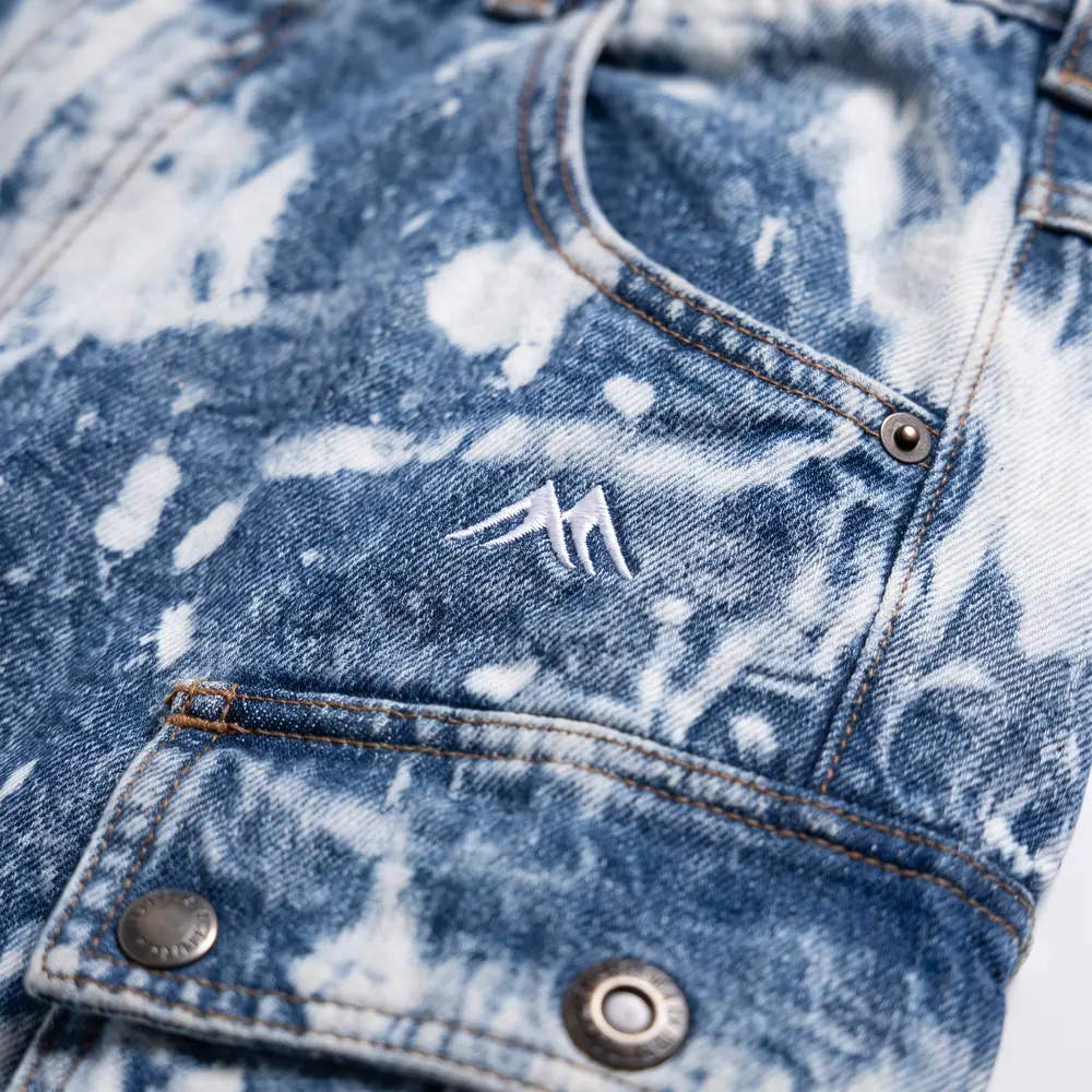 Washed Denim Acid Wash: logo and embroidery close-up, concept render